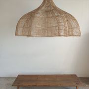 Huge rattan suspension in the shape of a corolla H:1m; D: 1m50