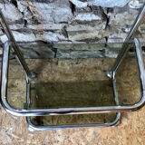 Chromed metal shelf and smoked glass