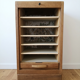 Solid oak filing cabinet with curtains