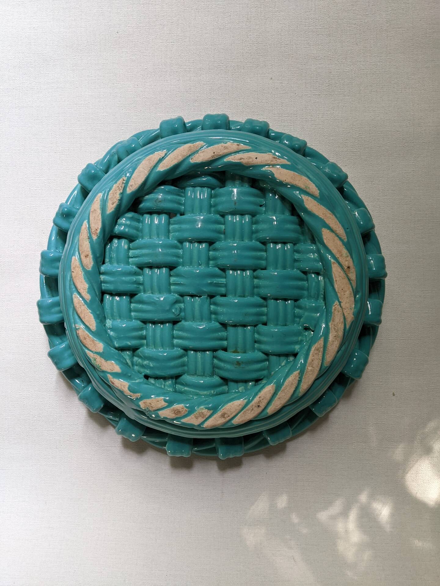 Woven ceramic fruit bowl from the 1950s