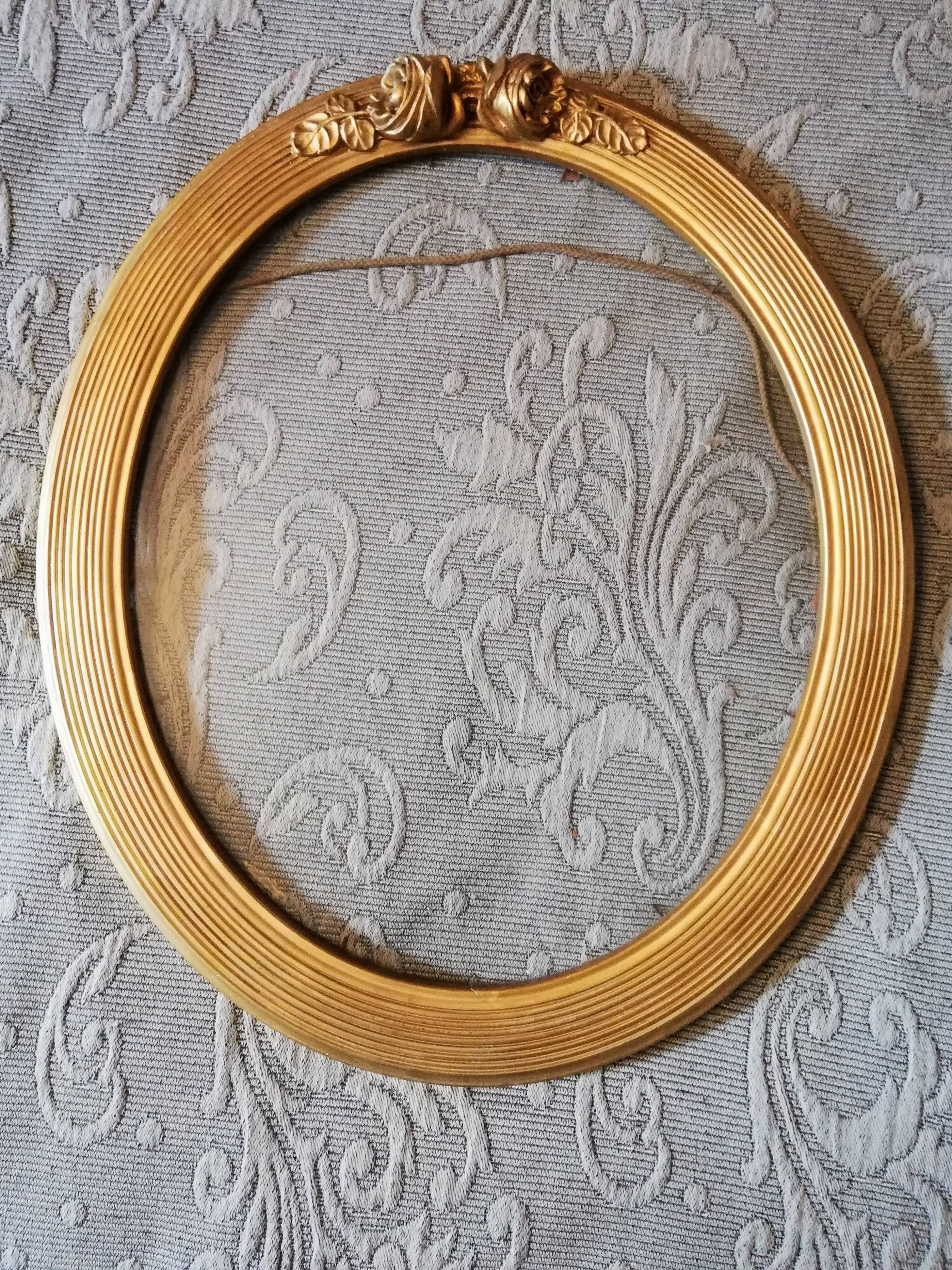 Oval gold frame art deco