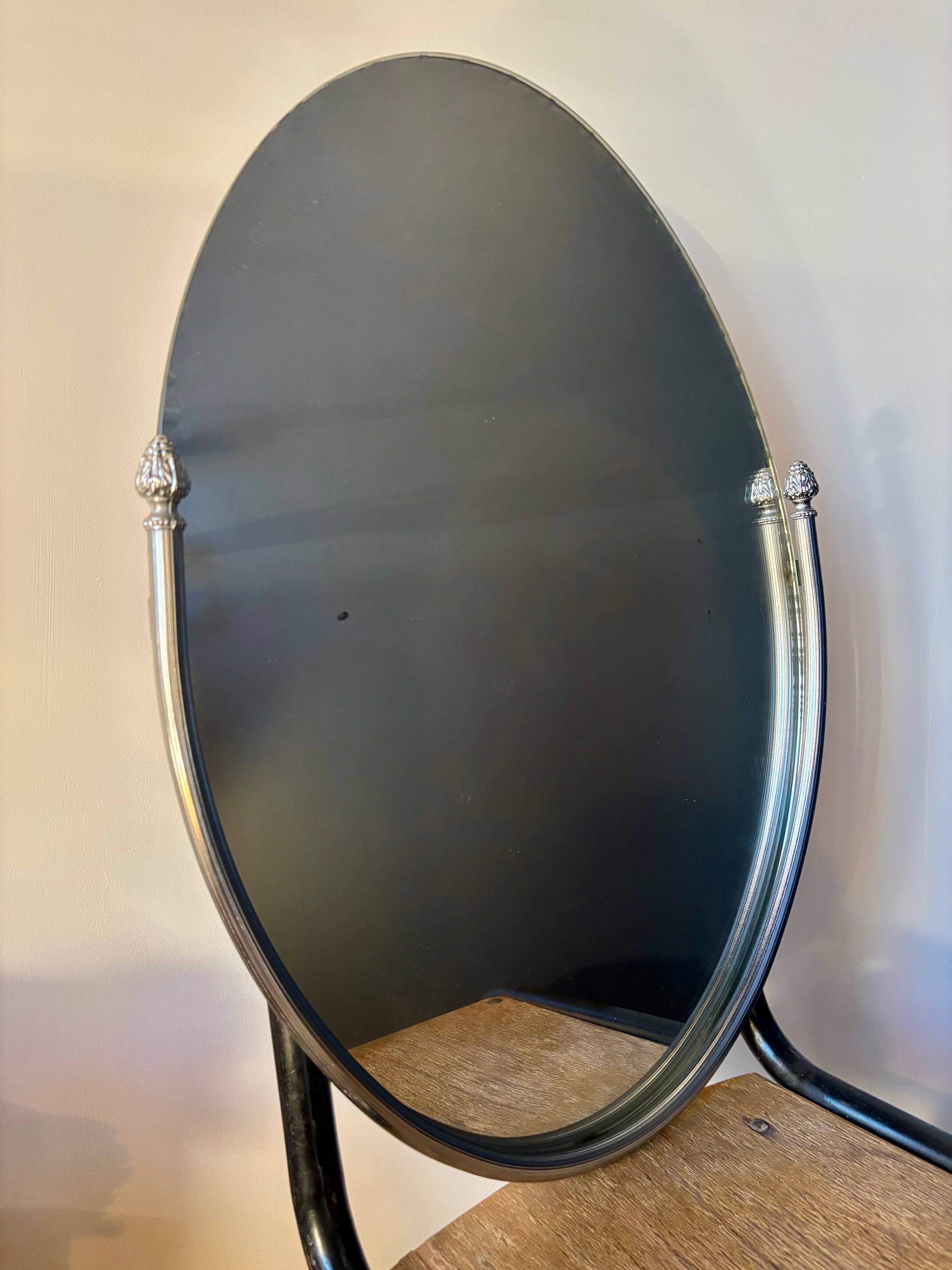 Oval beveled mirror