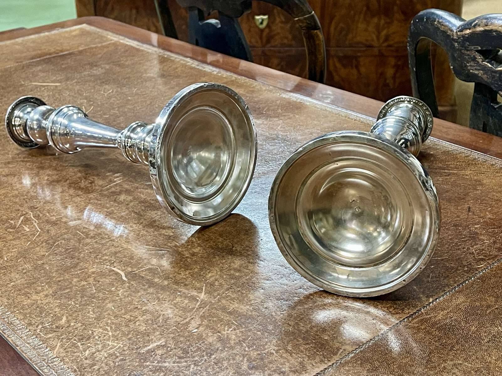 Pair of silver-plated metal candlesticks from the early 20th century