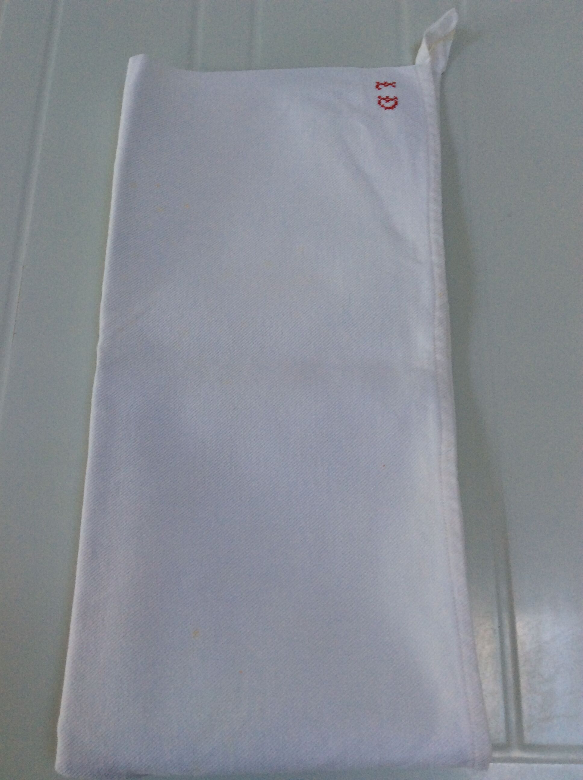 Old tea towel in thick cotton