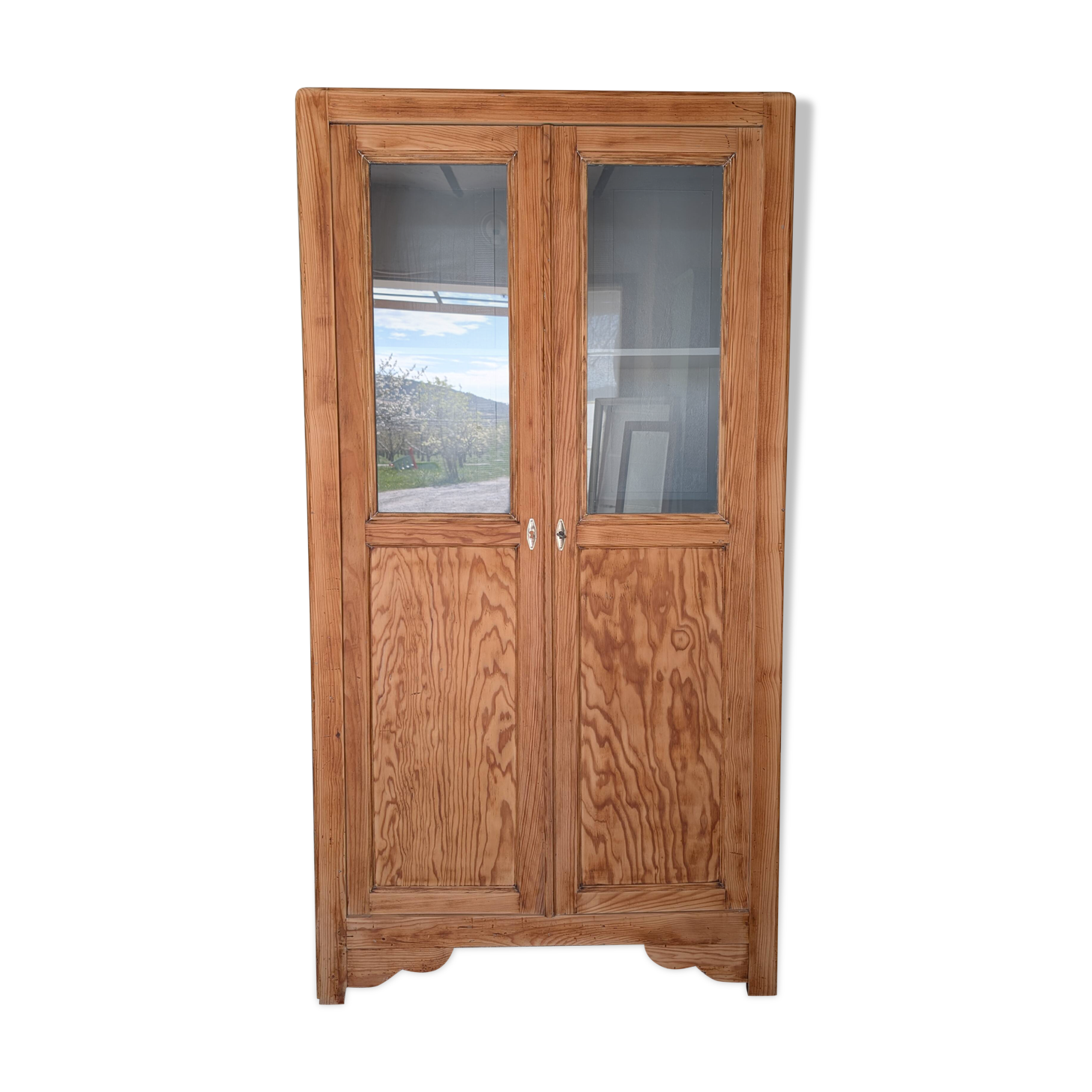 Old glass-fronted wooden library – blue interior