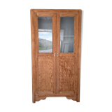 Old glass-fronted wooden library – blue interior