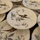 13 decorative plates with hummingbird design in fine earthenware by Mouzin Lecat, 19th century.