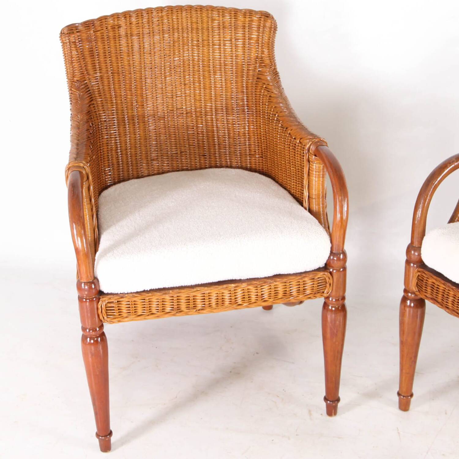 Pair of wooden and wicker armchairs