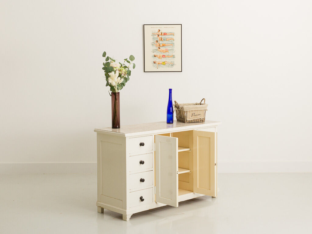 Small accent cabinet with drawers and swing doors