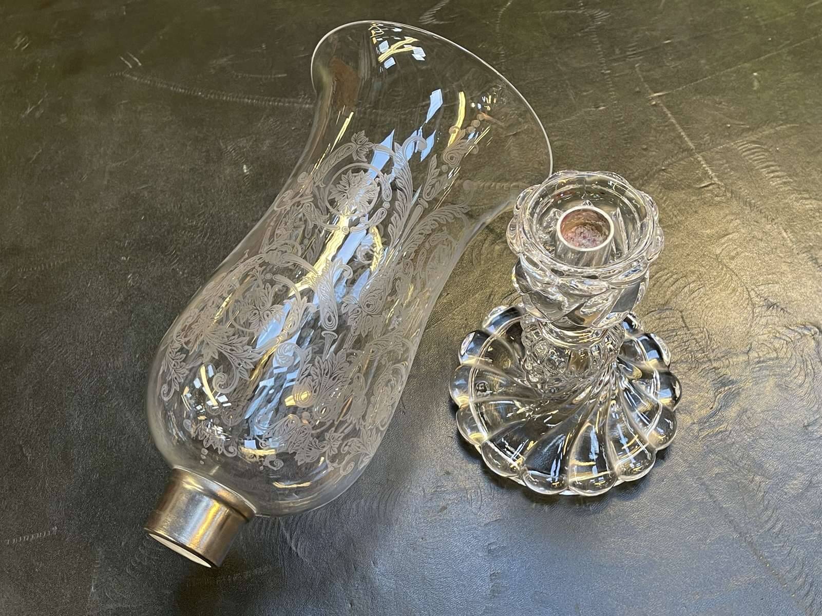 Baccarat crystal lantern with engraved foliage decoration.