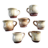Set of 7 vintage stoneware yellow coffee cups