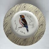 7 antique plates decorated with birds