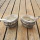 Old pair of oval metal salt shakers with louis xvi style verrine