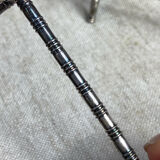 Six bamboo-patterned metal silver-plated knife rests.