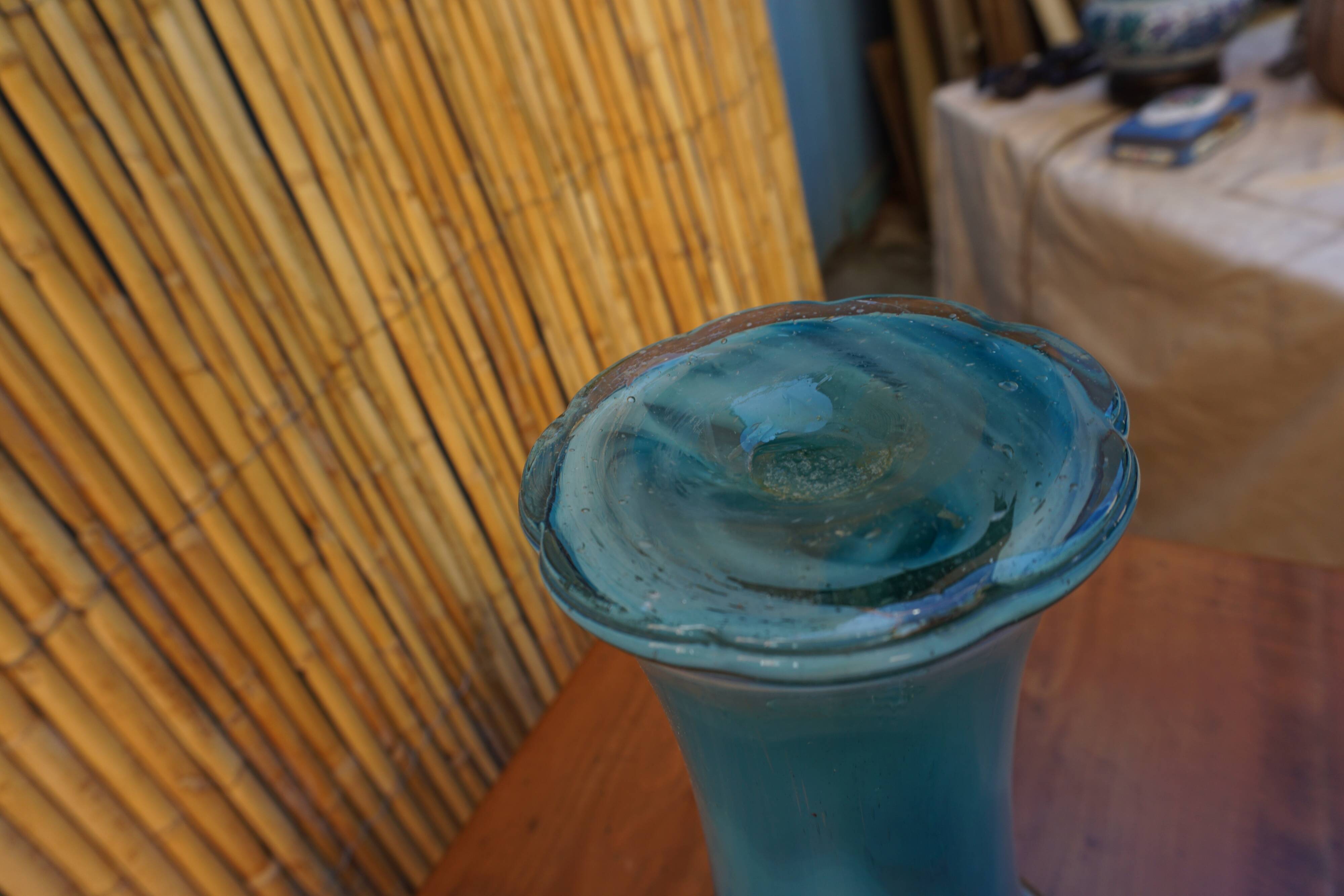 Blown glass vase in flower shape