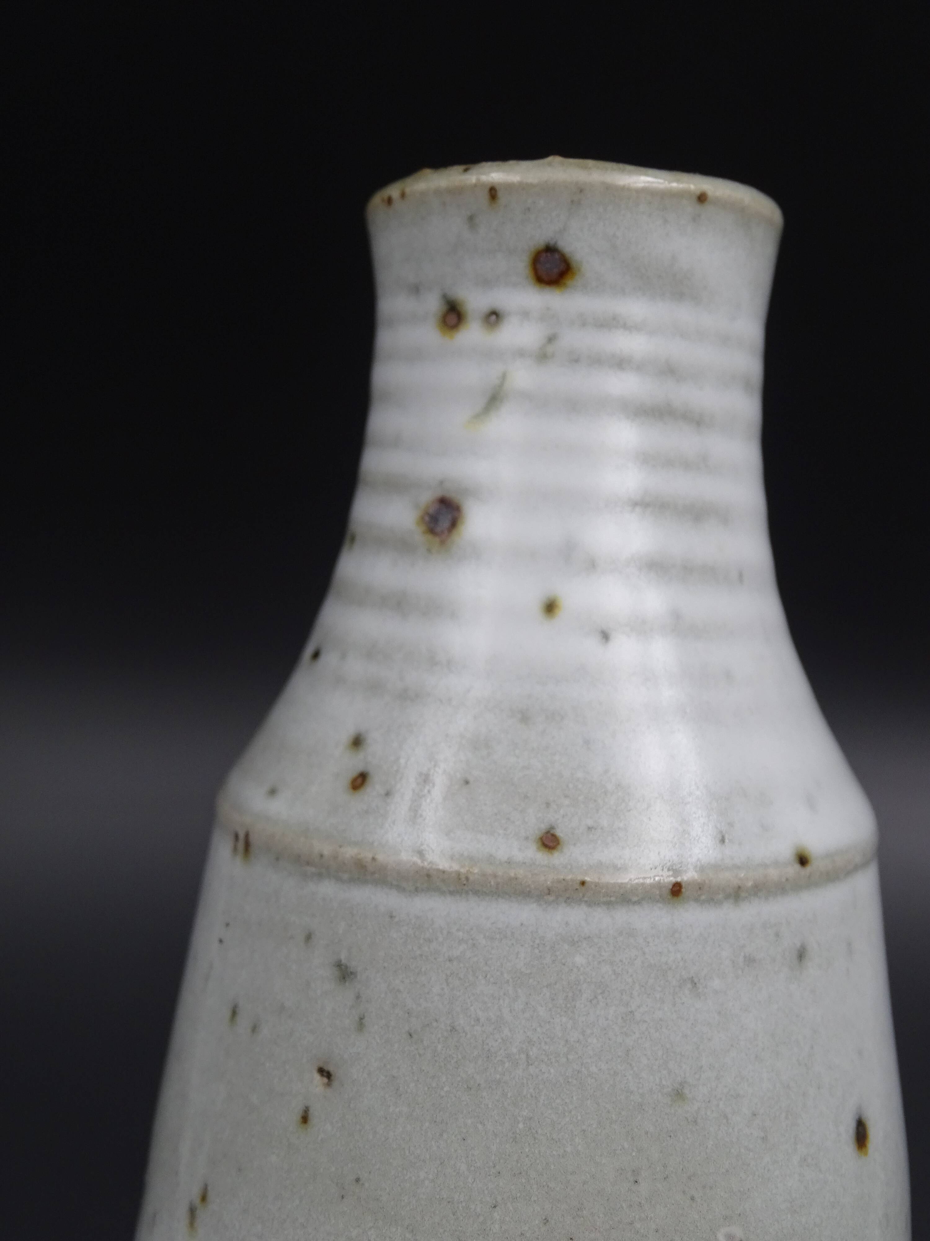 Sandstone vase with brown speckled decoration on a grey background - Bottle shape - Circa 1970 - Signed