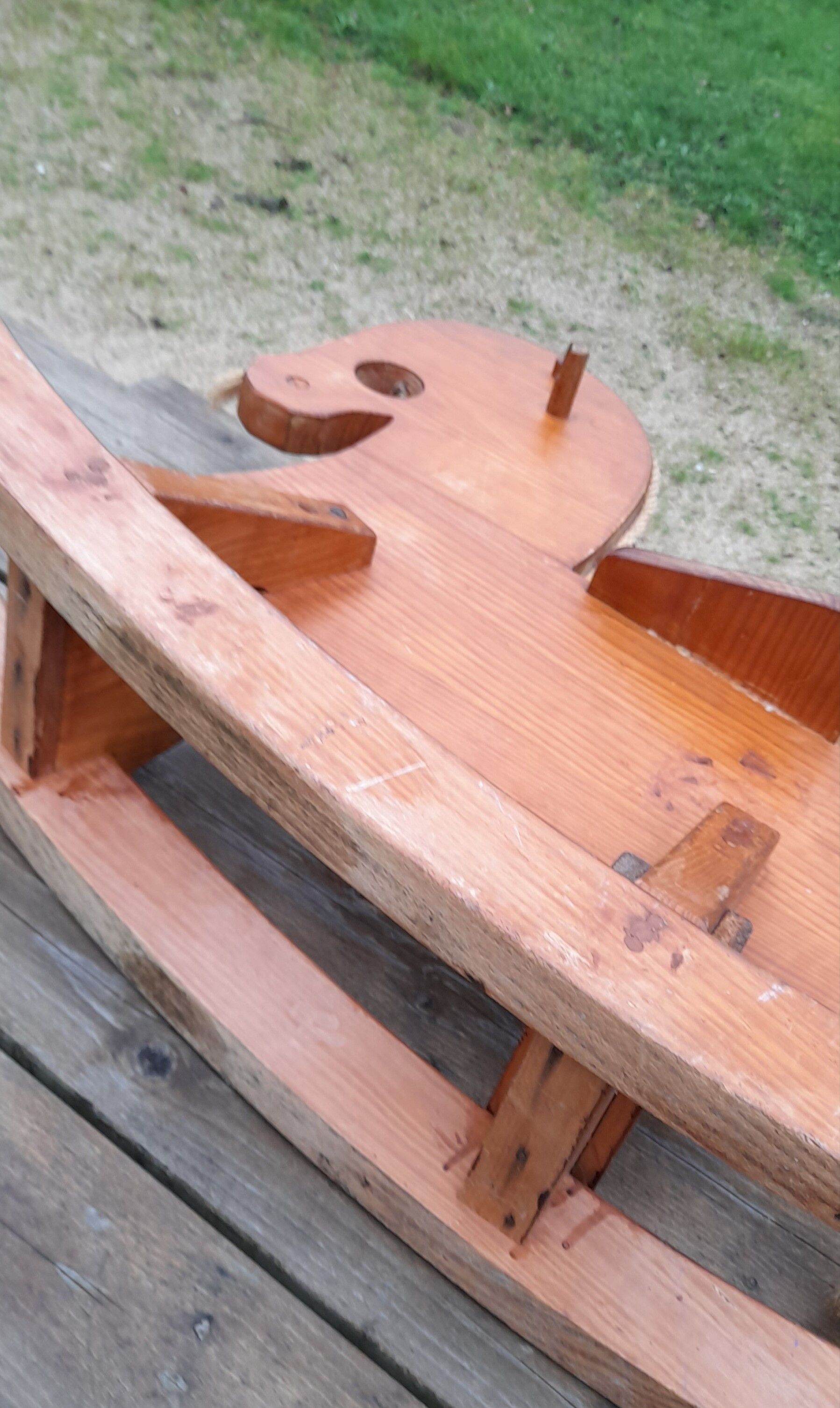 Rocking horse in raw and glazed wood