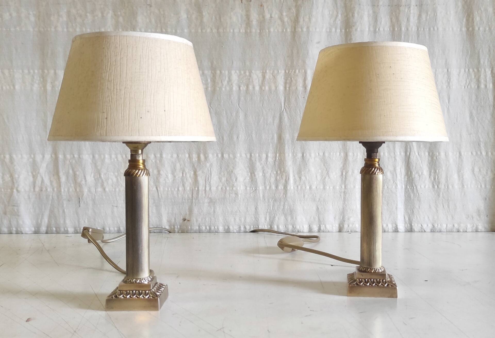 Table lamps in gilded brass with paper shades - mid 20th century.