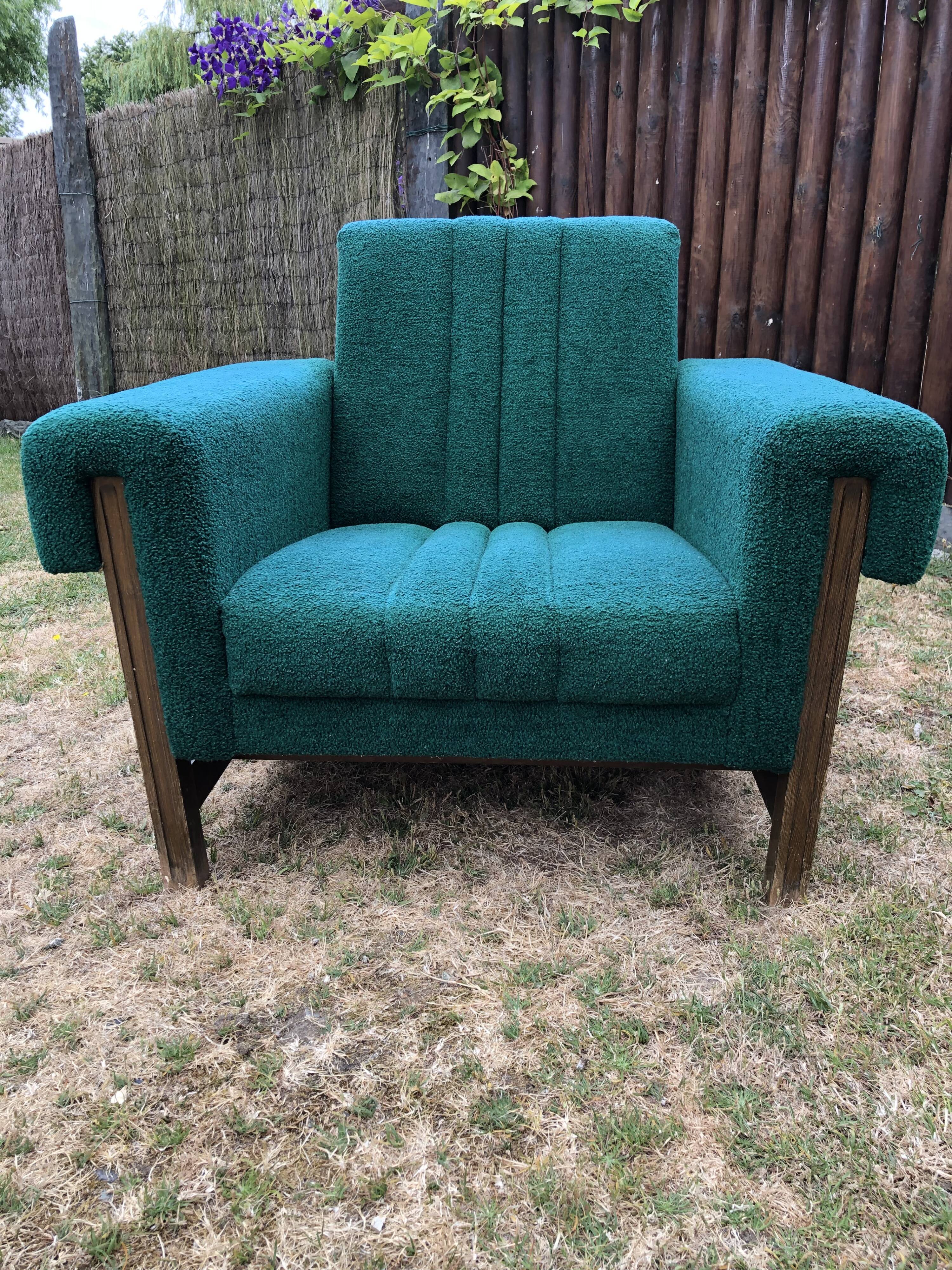 Duo of vintage armchairs with green fabrics.
