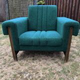 Duo of vintage armchairs with green fabrics.