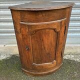 Small wooden corner accent table.