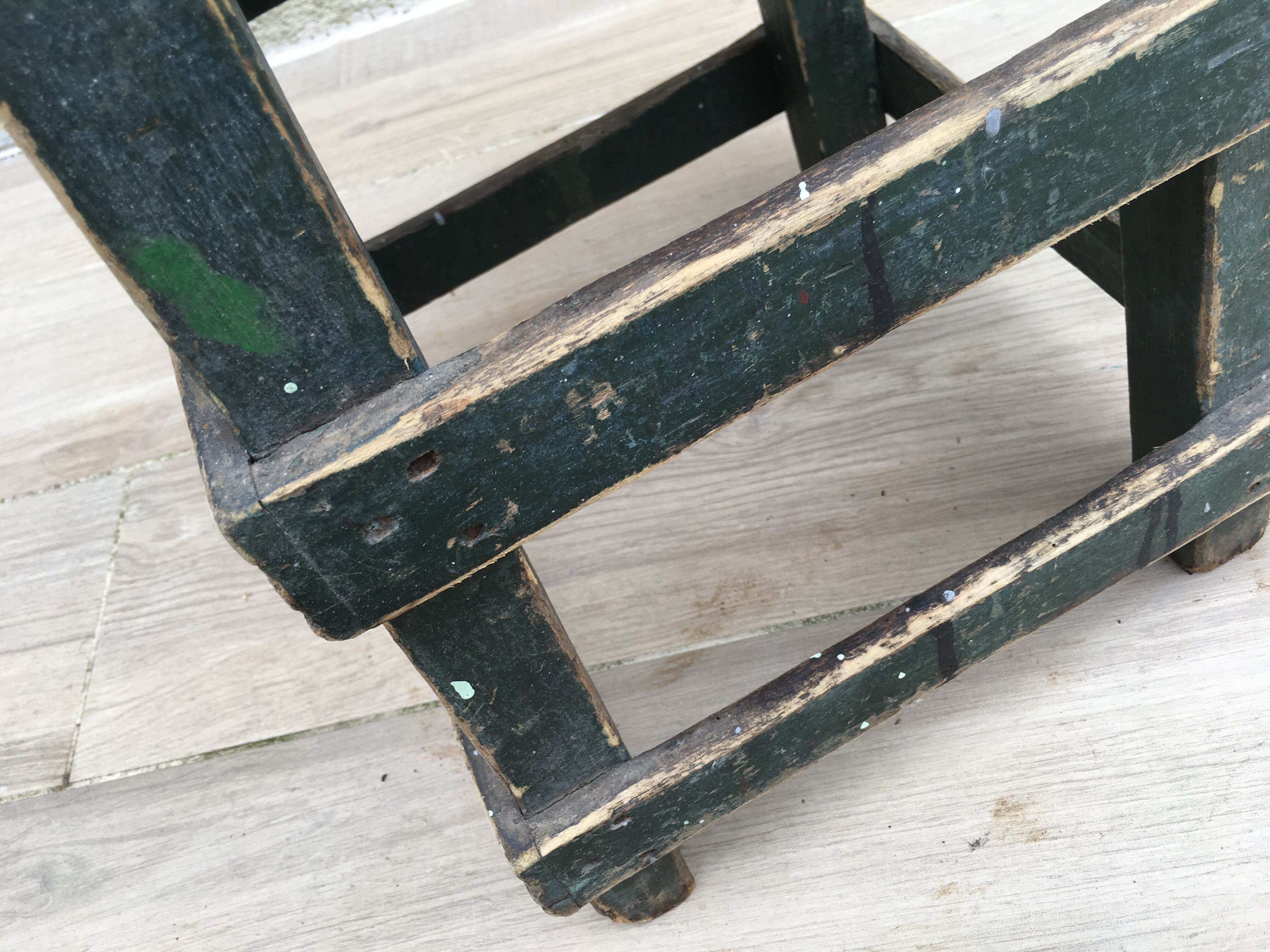 Former green workshop stool