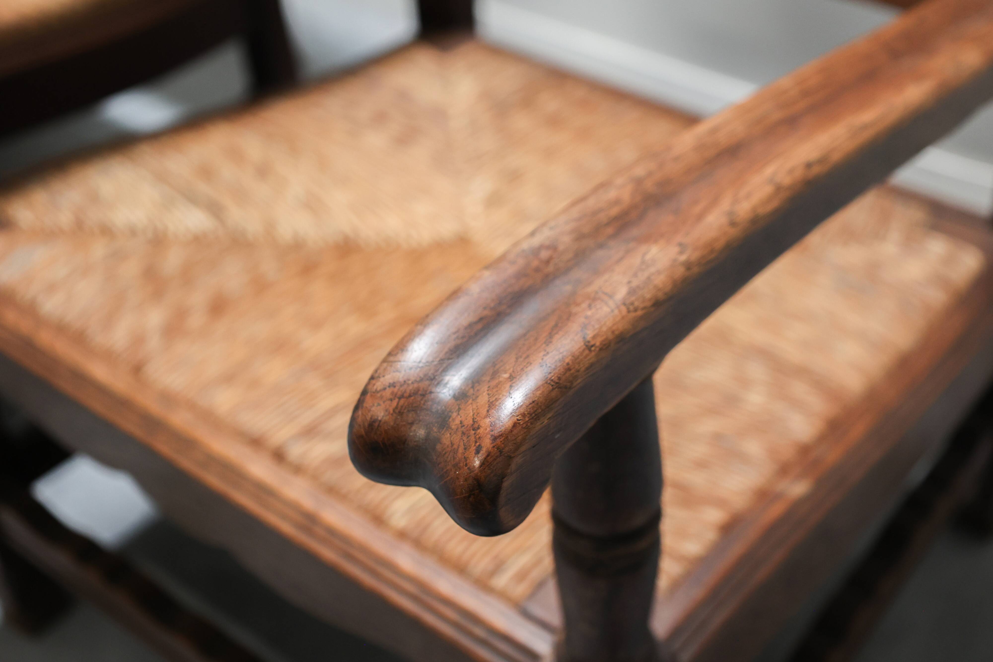 Mid-century rustic wooden armchairs with woven seat and back