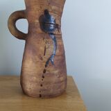 Pottery pitcher of the Dove