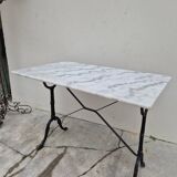 Antique marble and cast iron bistro restaurant table