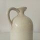 Vintage glazed stoneware pitcher, signed
