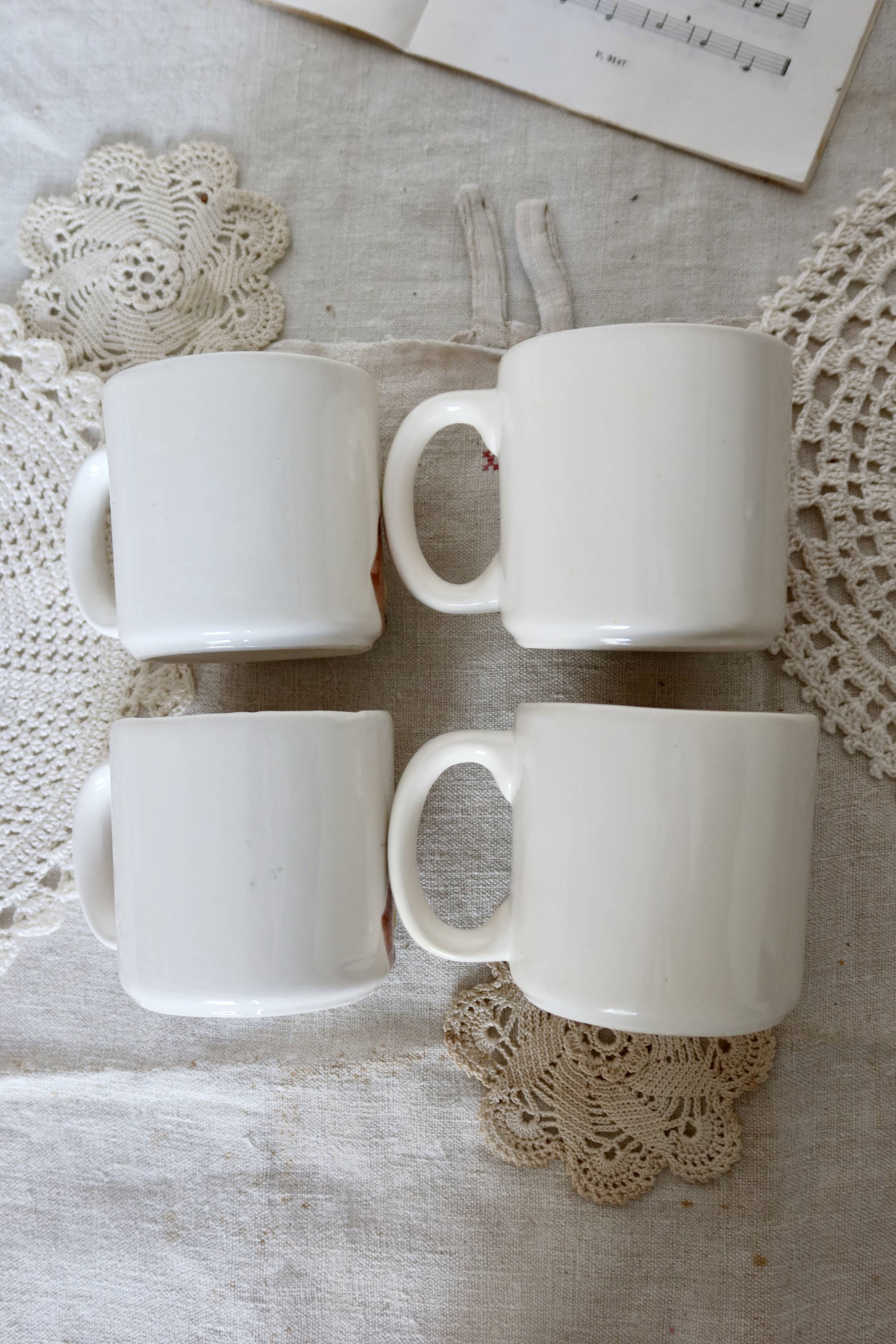 Set of 4 vintage barbotine cups / mugs with polychrome sunflower pattern