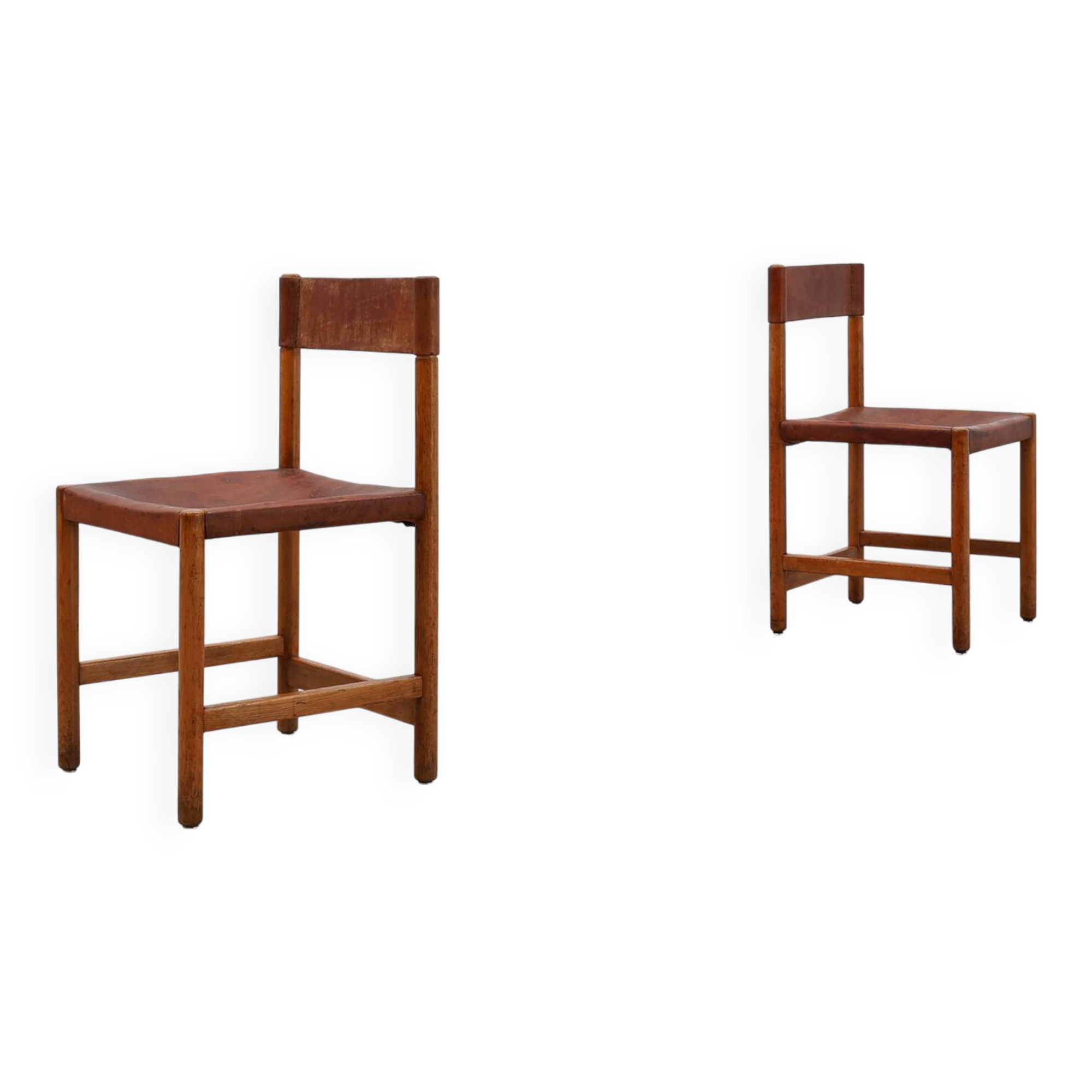 Pair of wood and leather Spanish chairs by Jordi Vilanova, ca. 1960