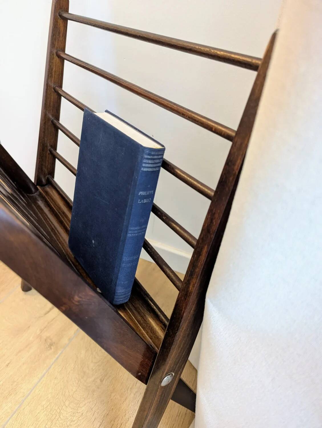 Vintage wooden magazine rack with Scandinavian design