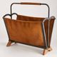 Vintage magazine rack from the 1950s, leather, brass, wood.