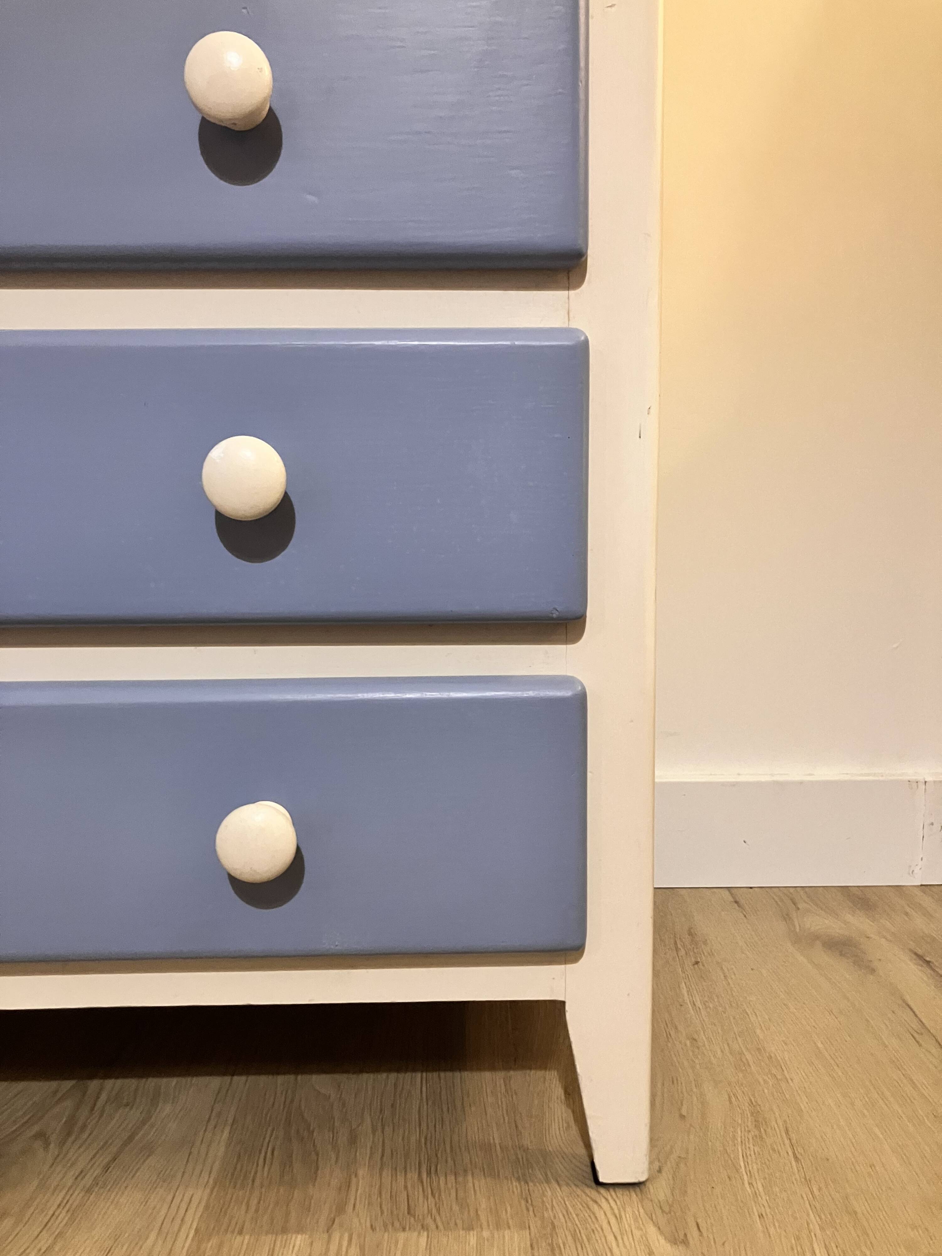 Wooden chest of drawers with tapered legs