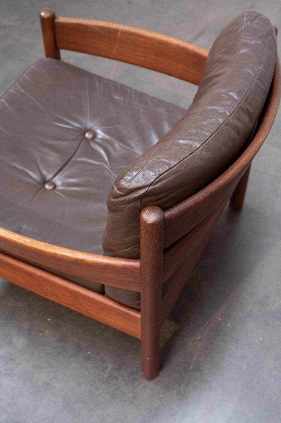Teak and leather armchair