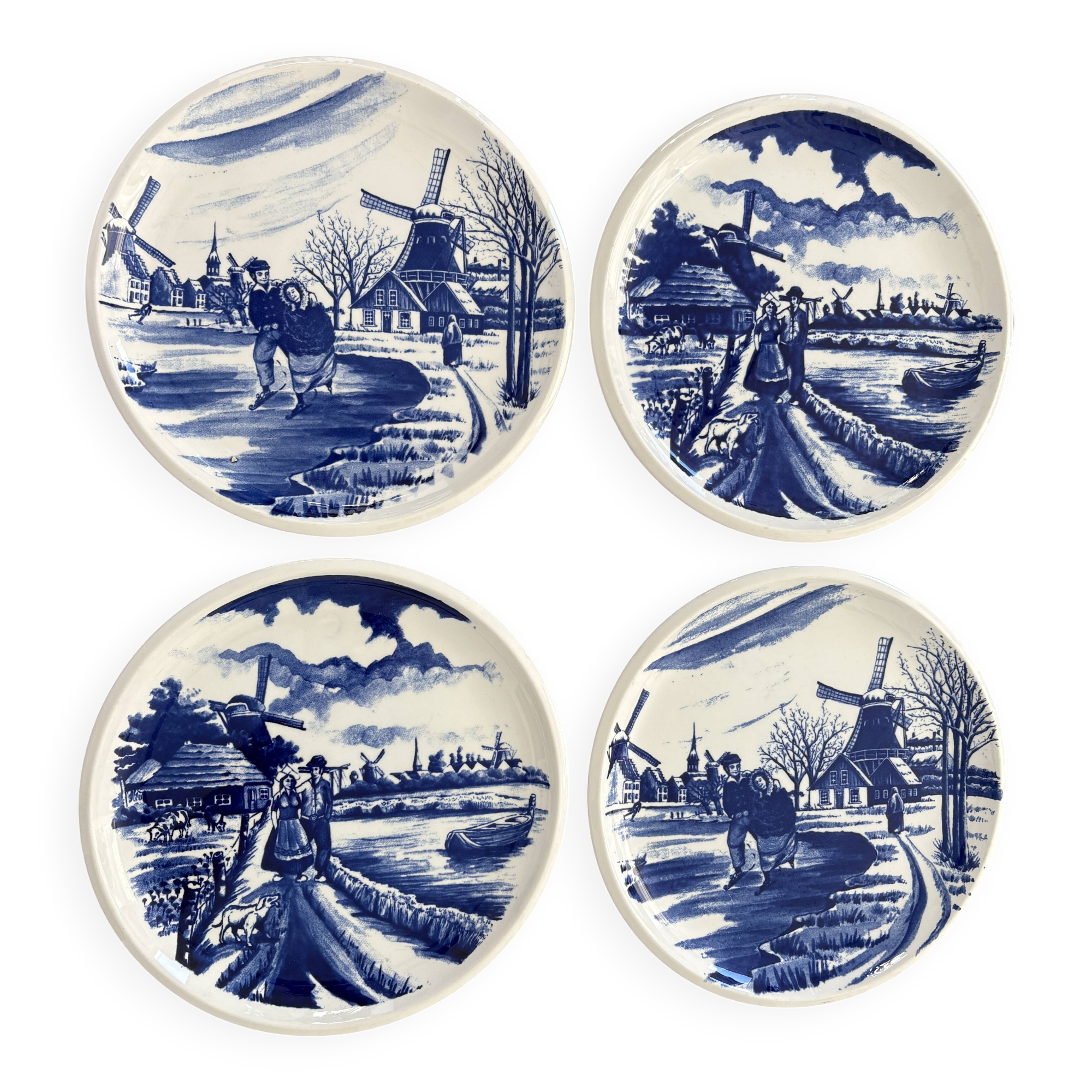 4 Delft Boch dinner plates