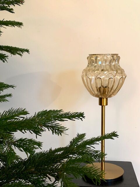 Table lamp with an old vintage golden lampshade