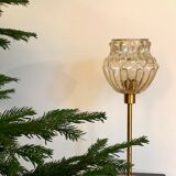 Table lamp with an old vintage golden lampshade