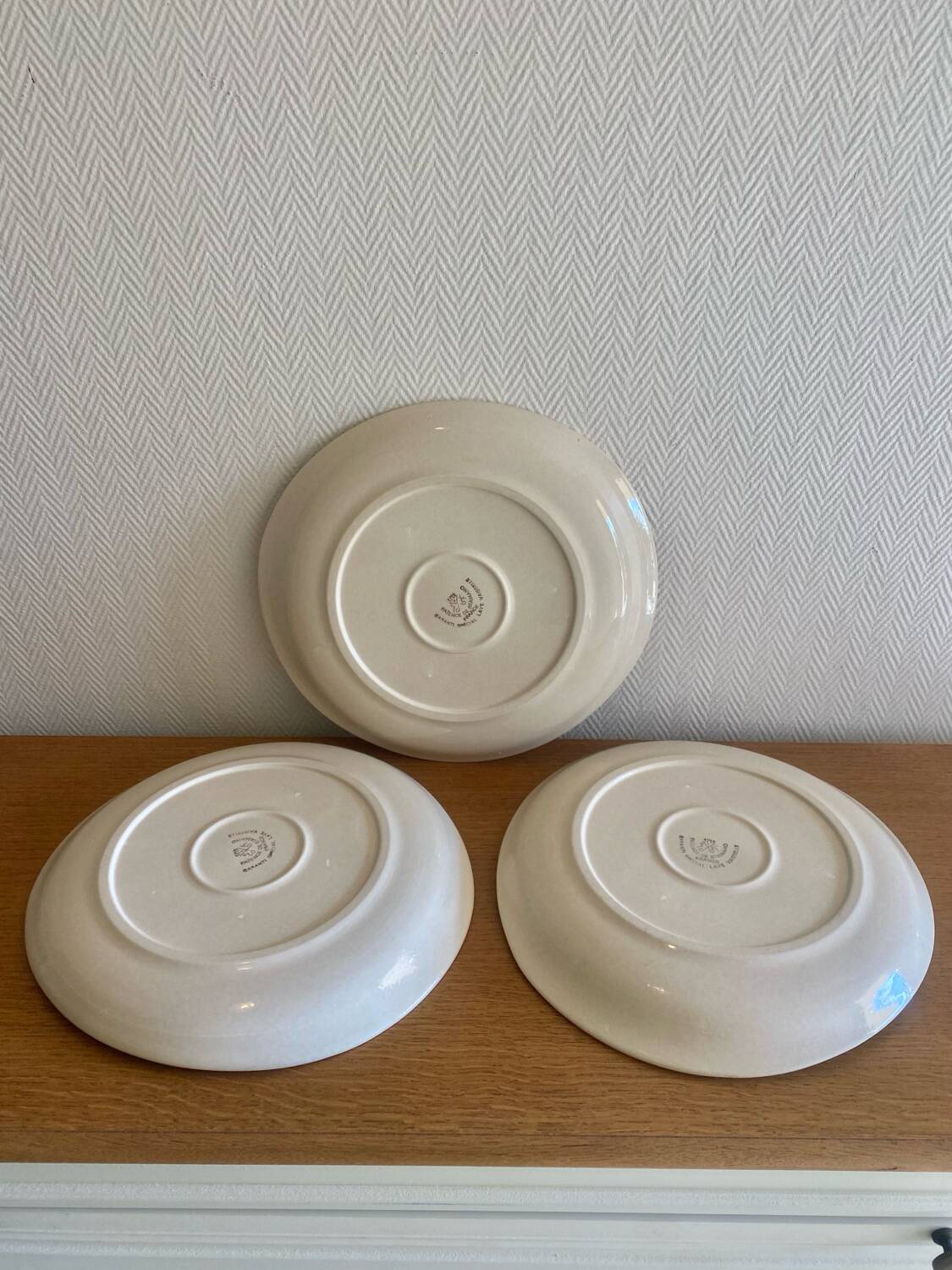 Saint Amand plates with cow head decoration.