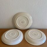 Saint Amand plates with cow head decoration.