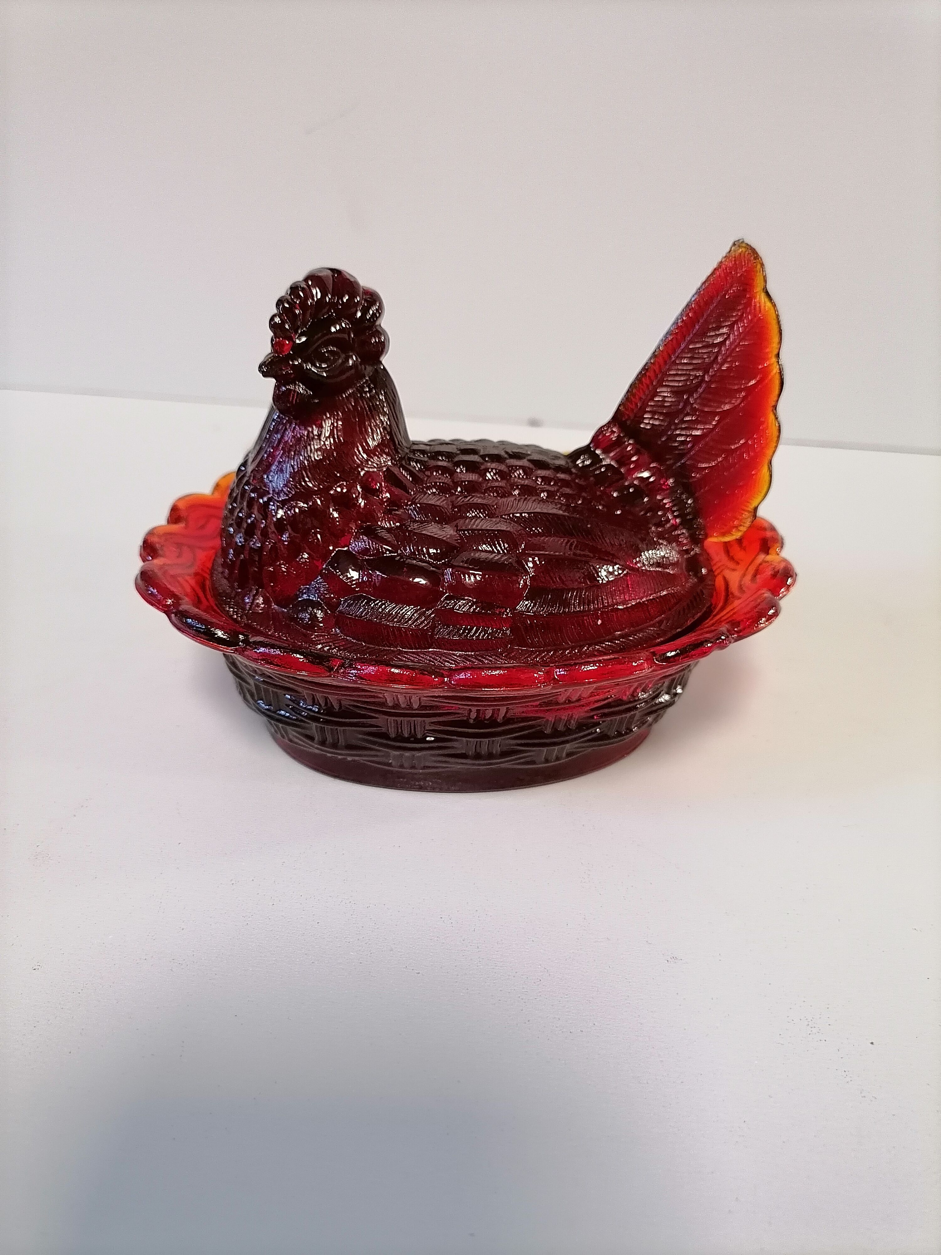 Poule en verre orangé sucrier