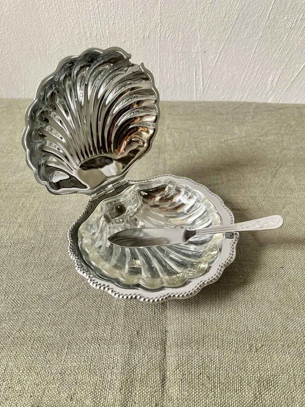 Metal shell butter dish with glass bowl and knife