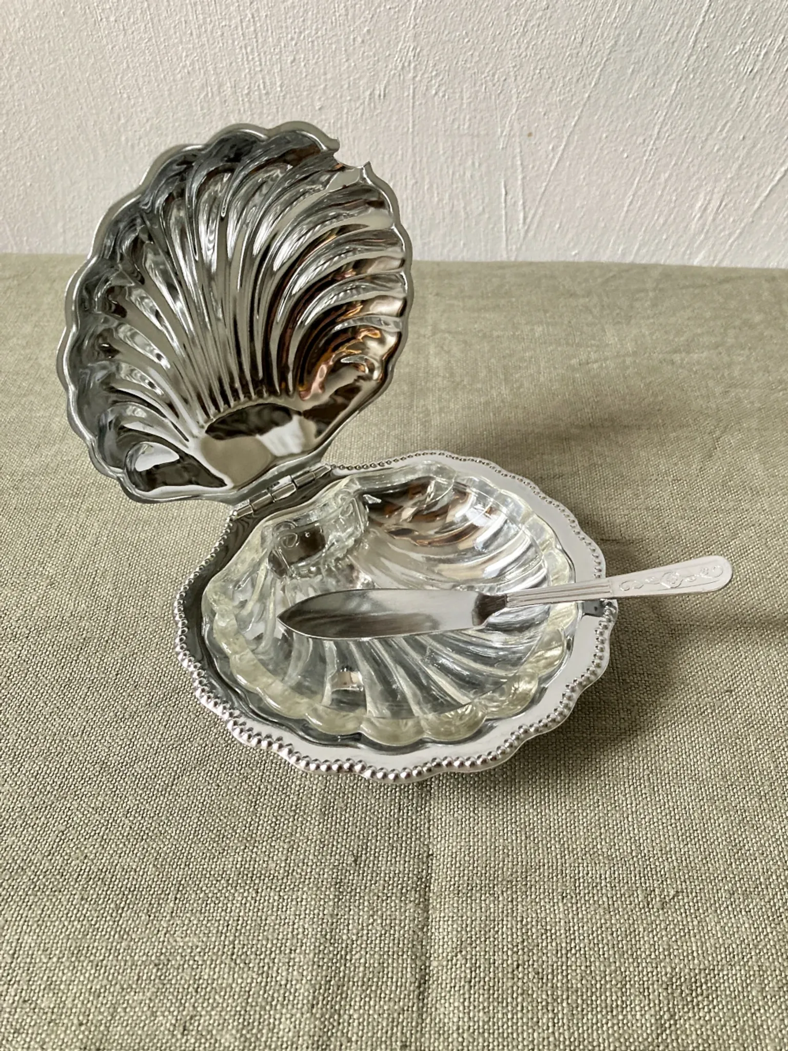 Metal shell butter dish with glass bowl and knife
