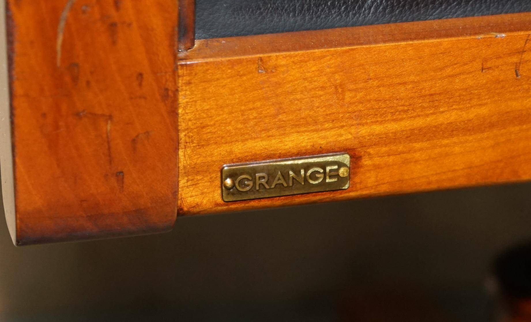 Captain's armchair in leather and cherry wood Grange Paris