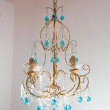 Italian chandelier in gold metal and blue crystal drops