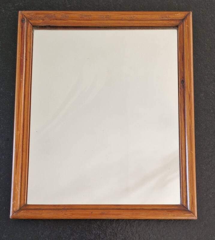 Carved wooden mirror from the Napoleonic III era in fir or pine from the 19th century.