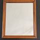 Carved wooden mirror from the Napoleonic III era in fir or pine from the 19th century.