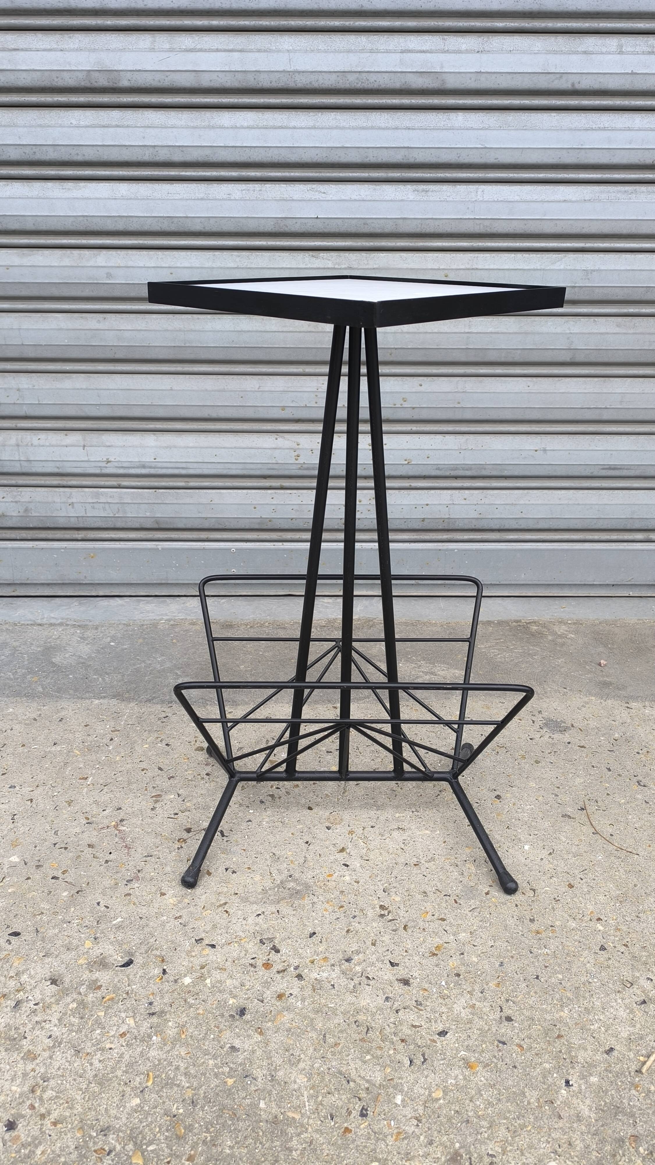 Iron and earthenware magazine rack, 1970