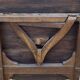 Old folding round winemaker's table with a tilting top.